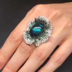 Green Embracing Flower Design Engagement Ring